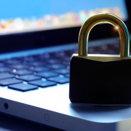 Padlock on computer keyboard